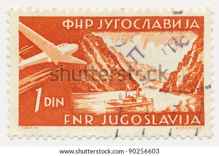 YUGOSLAVIA - CIRCA 1951: stamp printed by Yugoslavia, shows Danube gorge at Iron Gate and airplane, circa 1951