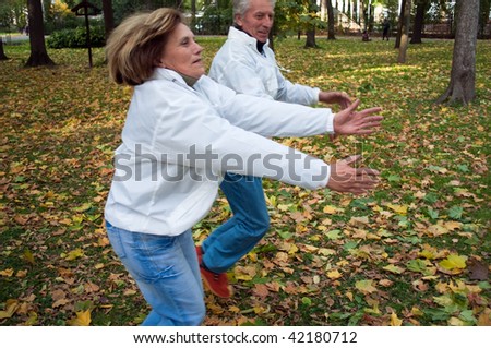 older people involved in sport in the autumn park