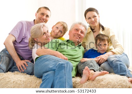 portrait of a happy family of seven people