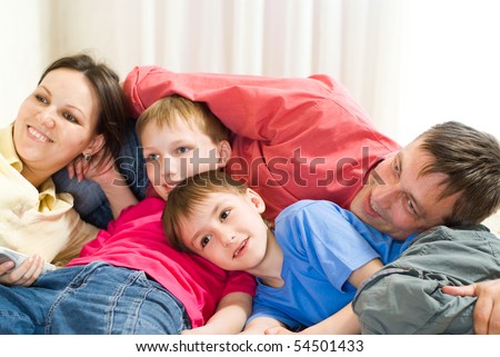 portrait of a happy family on the carpet