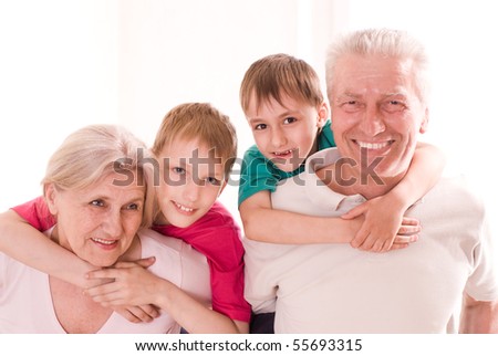portrait of a happy family playing on a white