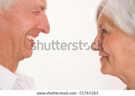 elderly couple together on a white background