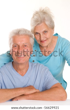 stock photo : happy elderly couple together on a white background