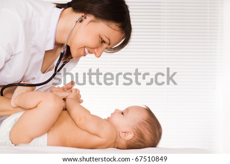 nice doctor with baby on a white background