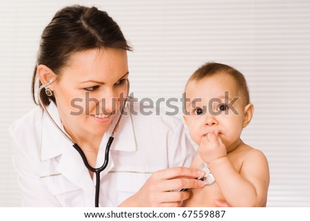 nice doctor with newborn on a white background