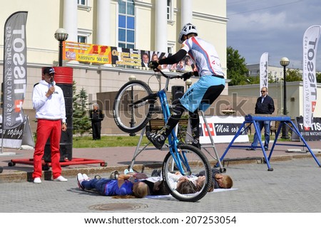 Mikhail Sukhanov , the champion of Russia on a cycle trial, acts in Tyumen on a holiday the City Day 26.07.2014