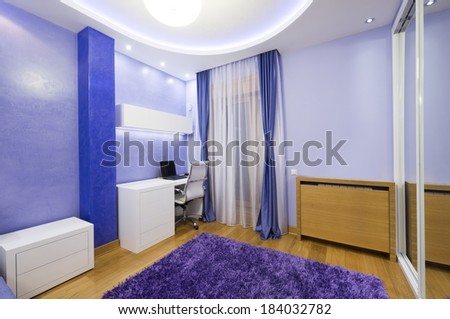 Interior of a modern purple living room with luxury ceiling
