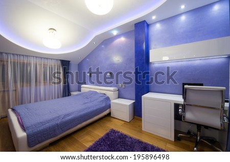 Interior of a modern purple bedroom with luxury ceiling