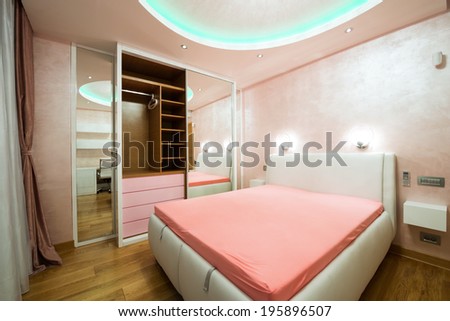 Interior of a modern bedroom with luxury ceiling