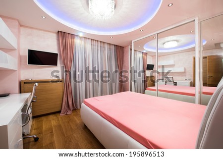 Interior of a modern bedroom with luxury ceiling lights