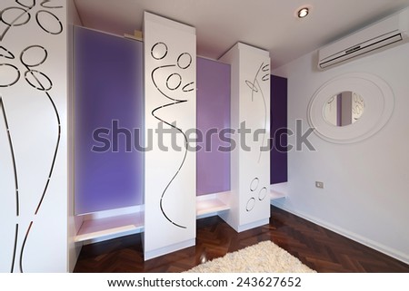 Interior of a modern dressing room with modern closet