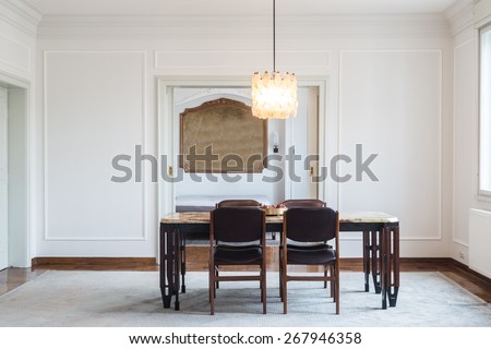 Vintage dining room with marble table