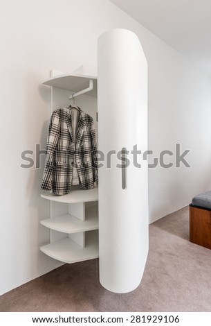 Apartment interior with modern white closet