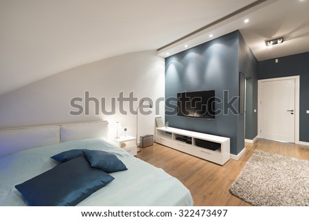 Modern bedroom interior in loft apartment
