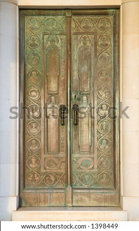 Large bronze doors that mark the entrance of a mausoleum in Cavtat, Croatia.