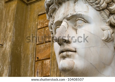 Close-up on the head of a very large statue of Roman emperor Augustus