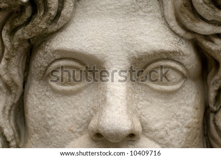 Close-up on the empty eyes of a Roman statue. Eyes are a window to the soul.