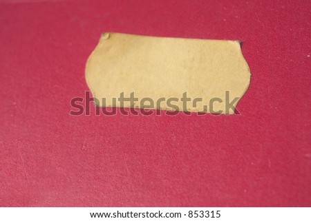 Yellow (price) sticker on a red background