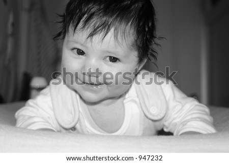 Close up of my baby daughter (3,5 months old). Looking at you in this lovely way, thinking \'Are you kidding me??\'