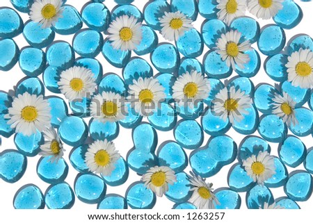 Nice background for a summer feeling, blue glass with daisies.