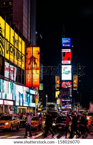 NEW YORK, USA - SEPTEMBER 28, 2013: The Times Square, one of the most visited tourist attractions in the world, at night on September 28, 2013 in Manhattan, New York City, USA.