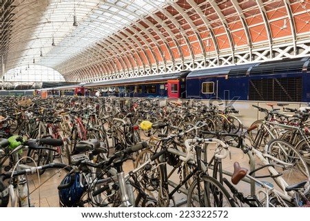 LONDON, UK - SEPTEMBER 26, 2014: Numerous bicycles left by train commuters at Paddington Station on September 26, 2014 in London, UK.