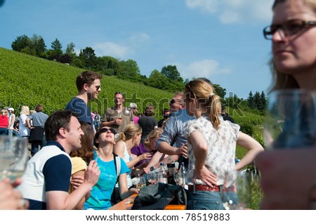 OBERTÜRKHEIM, GERMANY – JUNE 2: The „Weinmanufaktur Untertürkheim“ organized a wine tour all over the Ailenberg vineyard on June 2, 2011 in Obertürkheim near Stuttgart, Germany.