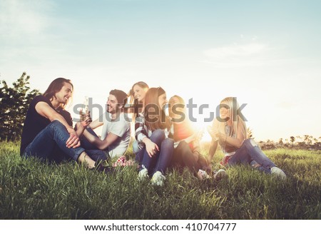 Group of young people having fun outdoors