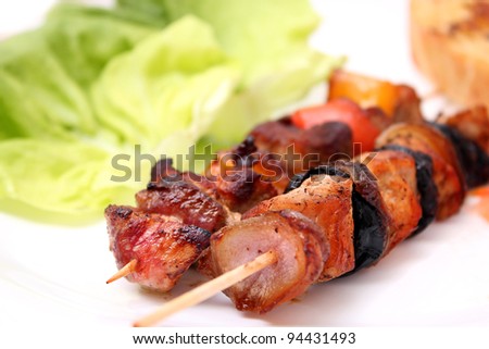 grilled meat and vegetables on skewers