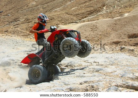 Jumping with quad in Israel desert