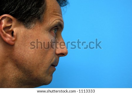 Man in Profile Staring with Steady Gaze