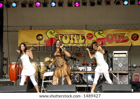 Shanice performing with dancers on stage at Soul Festival