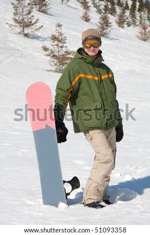Young man with snowboard