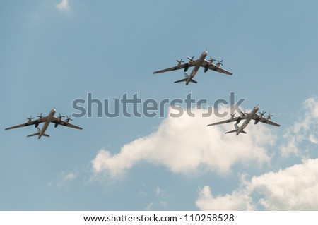 ZHUKOVSKY, MOSCOW REGION/RUSSIA - AUGUST 10: Three Tu-95 (Bear) strategic bomber and missile platform on airshow devoted to 100th anniversary of Russian Air Forces on August 10, 2012 in Zhukovsky.