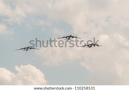 ZHUKOVSKY, MOSCOW REGION/RUSSIA - AUGUST 10: Three Tu-95 (Bear) strategic bomber and missile platform on airshow devoted to 100th anniversary of Russian Air Forces on August 10, 2012 in Zhukovsky.