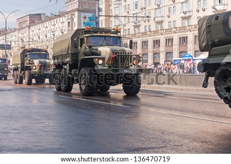 MOSCOW/RUSSIA - MAY 9: Russian Army Ural-4320 off-road 6x6 armoured truck motorcade moves on display during parade festivities devoted to 65th anniversary of Victory Day on May 9, 2010 in Moscow.
