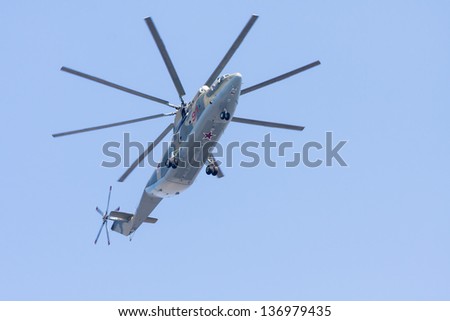 MOSCOW/RUSSIA - MAY 9: Mil Mi-26 (Halo) the largest and most powerful heavy transport helicopter flies during parade festivities devoted to 65th anniversary of Victory Day on May 9, 2010 in Moscow.