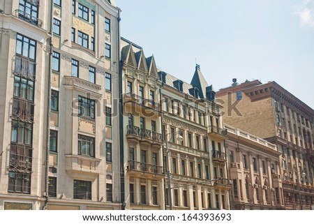 Beautiful building faÃ?Â§ades with stucco molding and bars balconies. Moscow, Russia.