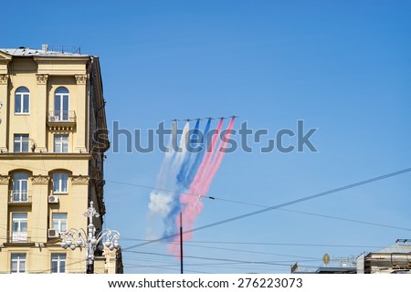 MOSCOW/RUSSIA - MAY 4: 6 Su-25BM Frogfoot jet aircrafts with color smokes of tricolor on rehearsal of parade devoted to 70-th Victory Day aniversary on May 7, 2015 in Moscow.