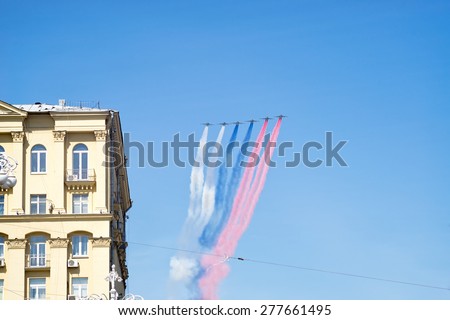 MOSCOW/RUSSIA - MAY 7: 6 Su-25BM Frogfoot jet aircrafts with color smokes of tricolor on rehearsal of parade devoted to 70-th Victory Day aniversary on May 7, 2015 in Moscow.