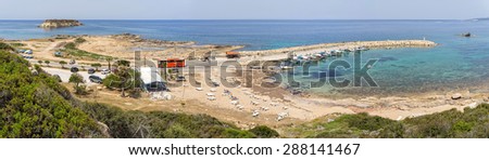 CAPE DREPANO, CYPRUS - APRIL 27: Panoramic view on marina with tied yachts and cars on parking on April 27, 2015 in Cape Drepano.