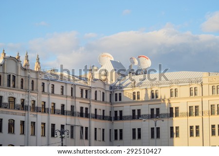 MOSCOW/RUSSIA - APRIL 10: Beautiful building facade with stucco molding and satellite dishes on roof on April 10, 2015 in Moscow.