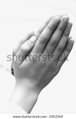 Black And White Hands Together. Two hands clasp together