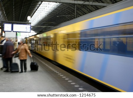Fast moving : Train leaving platform showing movement blur