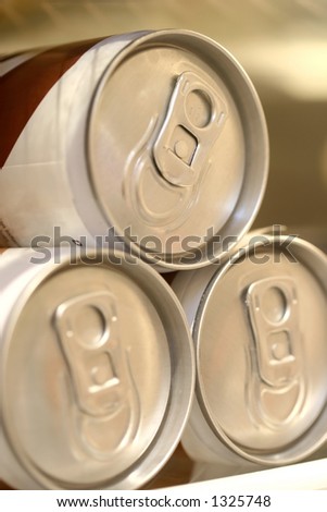 Light and chilled. Three canned drinks stacked together