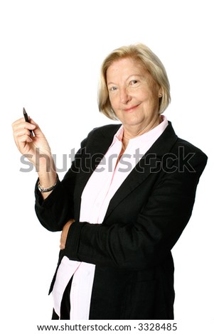 Mature caucasian businesswoman standing confident with a pen in the hand, isolated on white.
