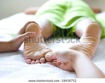 Woman receiving foot reflexology