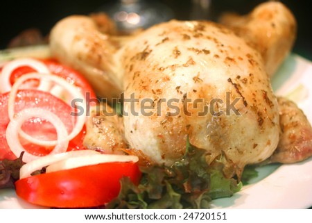 Whole roast chicken with fresh tomato salad