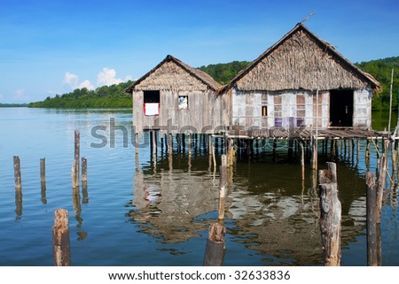 A traditional sea bajau home made out of wooden planks and thatched roofs found in a water\'s village near Tuaran, Sabah Malaysia