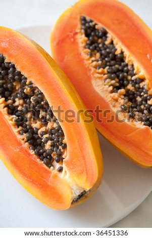 Delicious orange papaya with black seeds